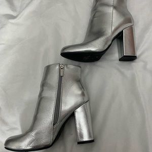 Silver boots. Good for Halloween costumes, parties.